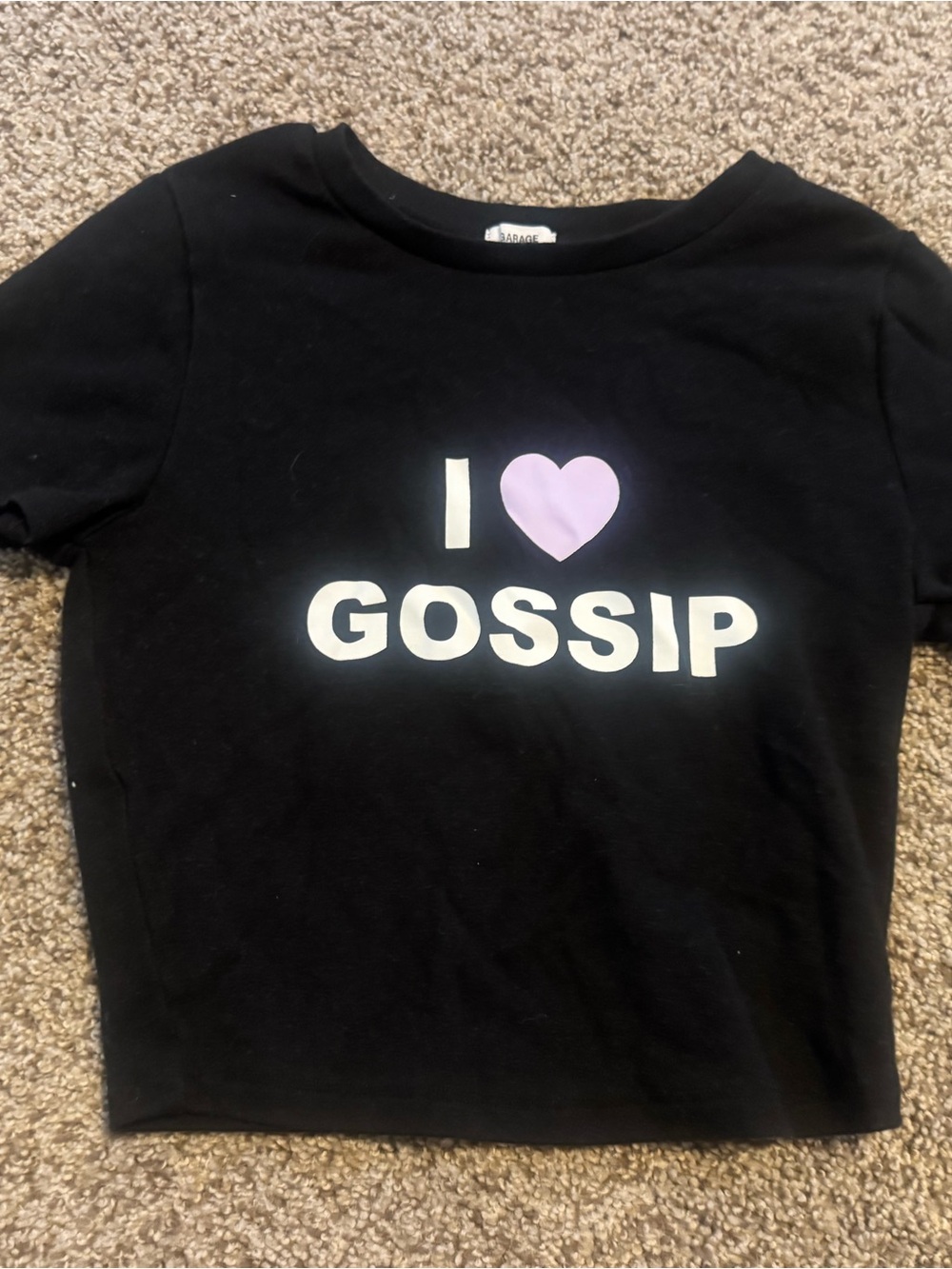 Garage Black Tee with White 'GOSSIP' and Light Purple Heart